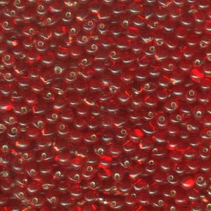 A Pile of Transparent Silver-Lined Red Drop Beads