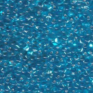 A Pile of Transparent Silver-Lined Topaz Drop Beads