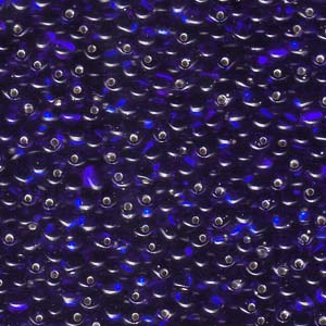 A Pile of Transparent Silver-Lined Cobalt Blue Drop Beads