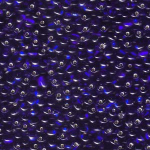 A Pile of Transparent Silver-Lined Cobalt Blue Drop Beads