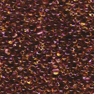 A Pile of Sparkling Amethyst Lined Light Topaz Drop Beads