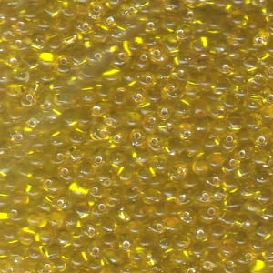 A Pile of Transparent Silver-Lined Yellow Drop Beads