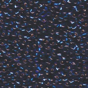 A Pile of Transparent Silver-Lined Capri Blue Drop Beads