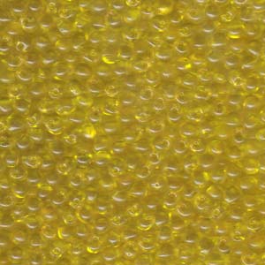 A Pile of Transparent Yellow Drop Beads