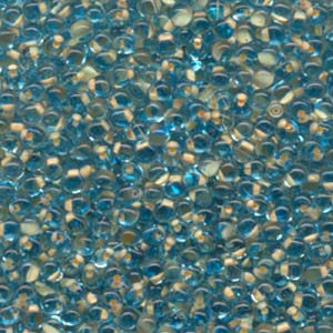 A Pile of Peach Lined Light Blue Drop Beads