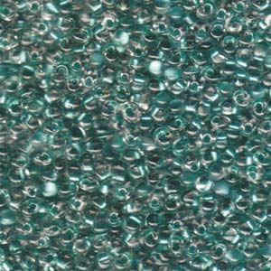 A Pile of Sparkling Aqua Green Lined Crystal Drop Beads
