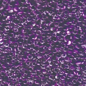 A Pile of Sparkling Purple Lined Crystal Drop Beads